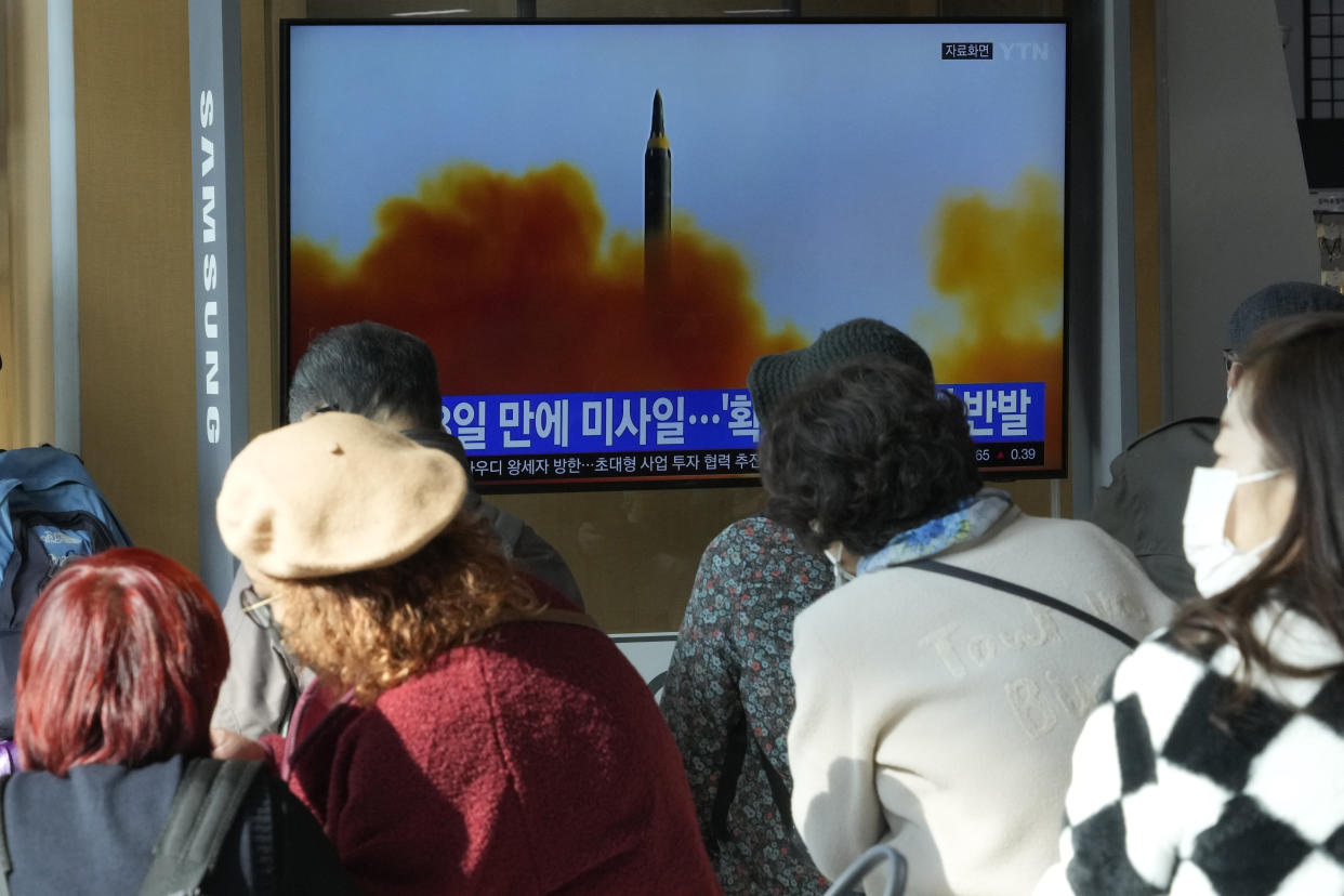 A TV screen shows a file image of North Korea's missile launch during a news program at the Seoul Railway Station in Seoul, South Korea, Thursday, Nov. 17, 2022. (AP Photo/Ahn Young-joon)