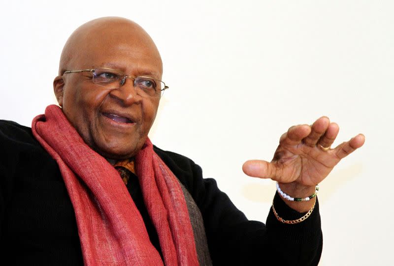 FILE PHOTO: South African Archbishop and Nobel Laureate Tutu speaks during an interview with Reuters in New Delhi