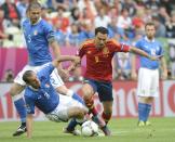 Spanish midfielder Xavi Hernandez (R) vies with Italian defender Giorgio Chiellini during the Euro 2012 championships football match Spain vs Italy on June 10, 2012 at the Gdansk Arena. AFP PHOTO / PIERRE-PHILIPPE MARCOUPIERRE-PHILIPPE MARCOU/AFP/GettyImages