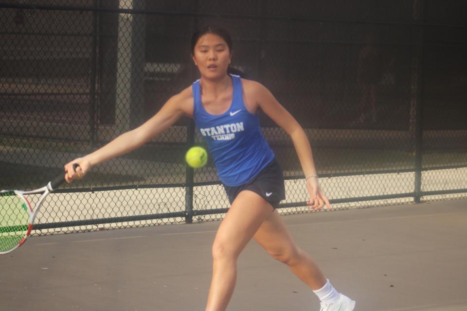 Stanton's Katie Wong hits the ball during a girls tennis individual singles match against Ella-Jane Eddy of Episcopal on March 4, 2024. [Clayton Freeman/Florida Times-Union]