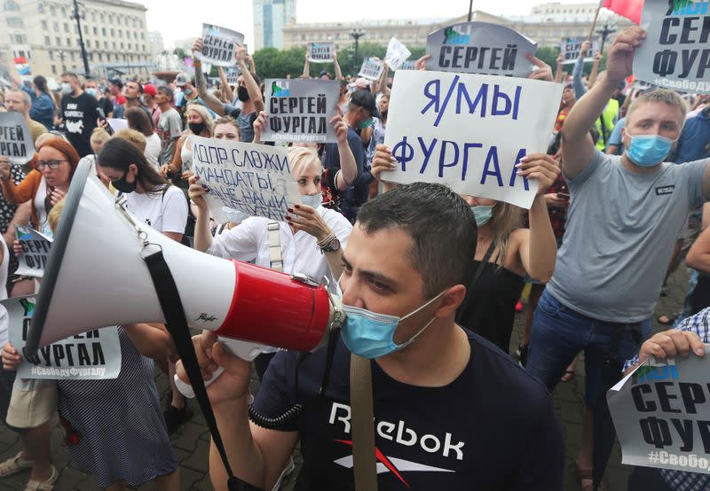 People take part in a rally in support of former regional governor Sergei Furgal in Khabarovsk