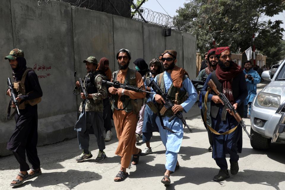 Taliban fighters patrol in Wazir Akbar Khan neighborhood in the city of Kabul, Afghanistan, on Aug. 18, 2021.