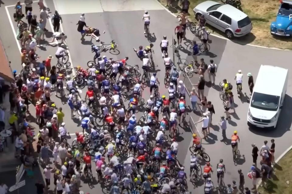 <p>NBC Sports/YouTube</p> A fan taking a selfie set off a massive crash at stage 15 of the Tour de France on Sunday.