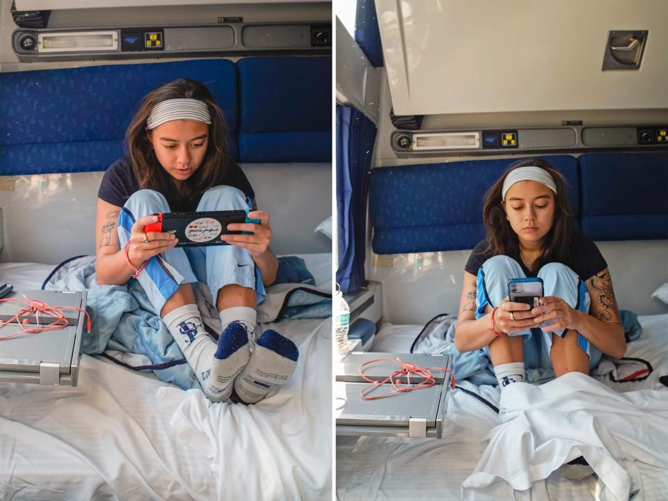 The author plays on her nintendo on the left and phone on the right