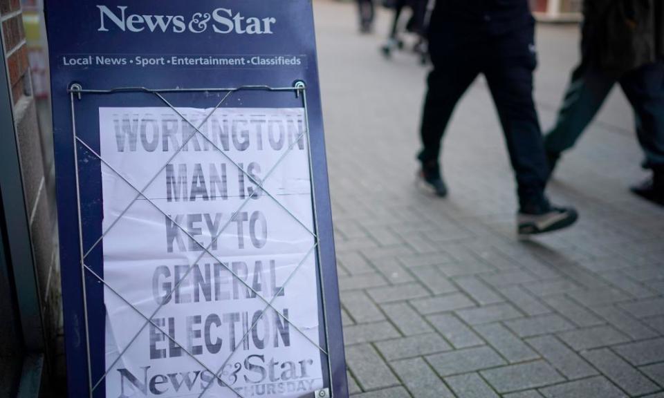 A newsagent's board in Workington, Cumbria