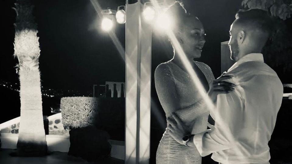 Mel B and her fiance Rory dancing at night