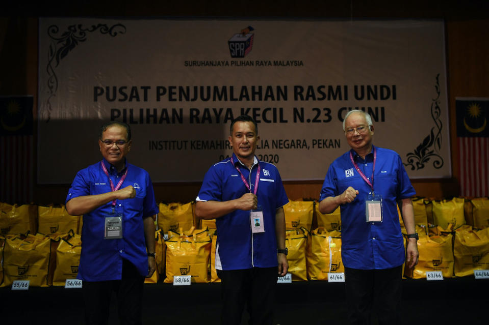 Barisan Nasional candidate Mohd Sharim Md Zain with Pahang Mentri Besar Datuk Seri Wan Rosdy Wan Ismail and Pekan MP Datuk Seri Najib Tun Razak after winning the Chini state by-election, July 4, 2020. — Bernama pic