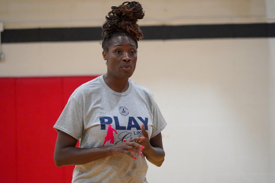 Former WNBA player Rushia Brown speaks to girls during the Indianapolis Metropolitan Police Department's 'Play like a Girl' basketball clinic, on Saturday, July 27, 2024, in Indianapolis.