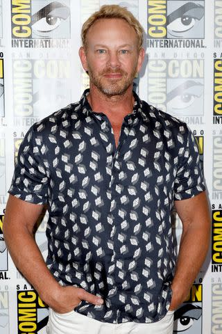 <p>Frazer Harrison/Getty</p> Ian Ziering attends the "Sharknado" 10th Anniversary photo call at Comic Con