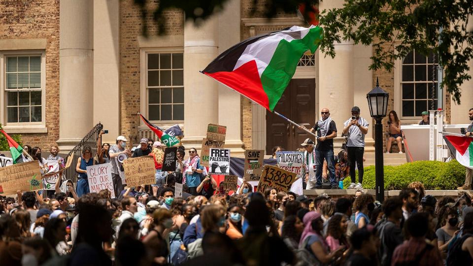 Anti-Israel protesters wave Palestinian flag at UNC Chapel Hill