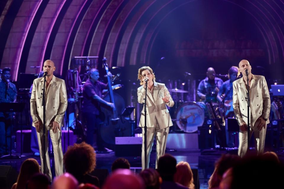 HOLLYWOOD, CALIFORNIA - FEBRUARY 08: (L-R) Phil Hanseroth, Brandi Carlile and Tim Hanseroth perform onstage during A GRAMMY Salute to The Beach Boys at Dolby Theatre on February 08, 2023 in Hollywood, California. (Photo by Matt Winkelmeyer/Getty Images for The Recording Academy)