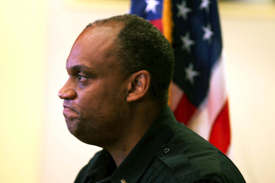 New Police Chief Chuck Lovell listens during a news conference announcing his appointment Monday, June 8, 2020, in Portland, Ore. Portland's police chief has resigned, just six months into her job, amid criticism of her department's handling of protests in Oregon's largest city. Lovell replaced her. The shakeup comes as police have been sharply criticized for using what some people called inappropriate force against some protesters. Lovell said at a press conference that his appointment was completely unexpected and he's going to care about the community. (Beth Nakamura/The Oregonian via AP)