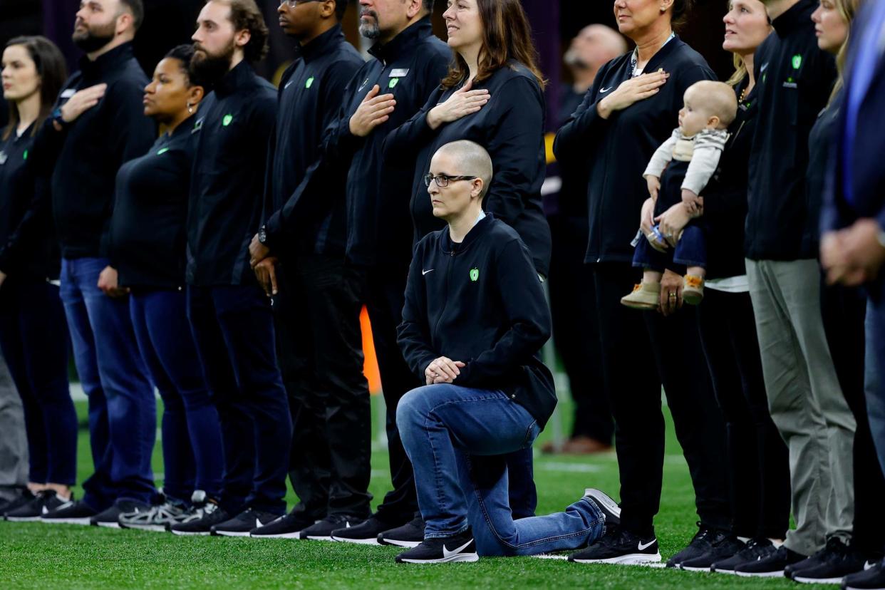 Kelly Holstine knelt during the national anthem at a college football game: Getty Images