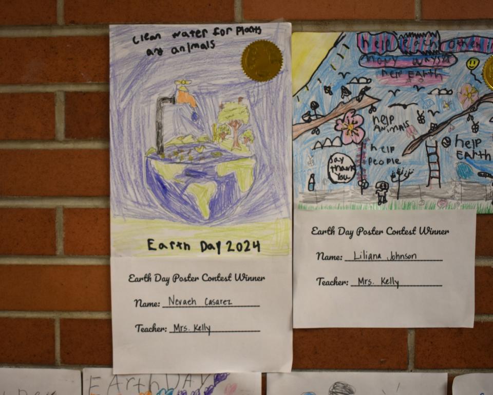 For Earth Day 2024, Michener Elementary student Nevaeh Casarez created this poster that says, "Clean water for plants and animals."