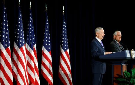 U.S. Secretary of State Rex Tillerson (R) and U.S. Secretary of Defense James Mattis hold a press conference following talks with Chinese diplomatic and defense chiefs at the State Department in Washington, U.S. June 21, 2017. REUTERS/Kevin Lamarque