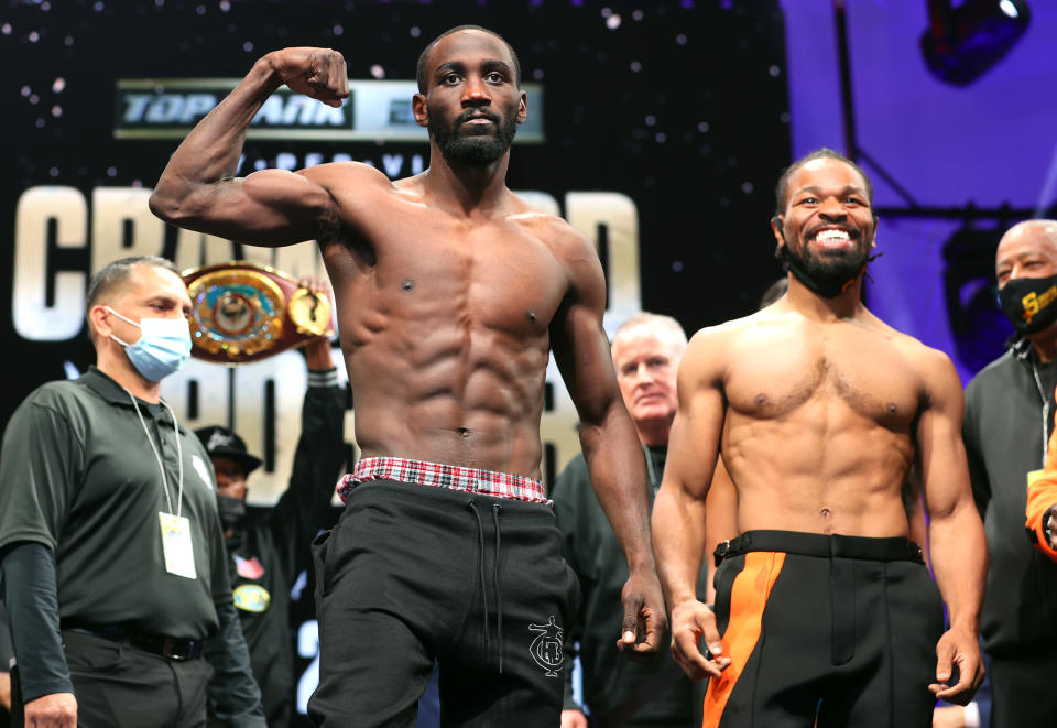 LAS VEGAS, NEVADA - NOVEMBER 19: WBO welterweight champion Terence Crawford (L) and Shawn Porter (R) pose during the weigh-in at Islander Ballroom at Mandalay Bay Hotel & Casino on November 19, 2021 in Las Vegas, Nevada. (Photo by Mikey Williams/Top Rank Inc via Getty Images)