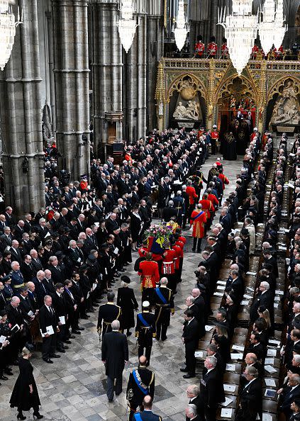 LONDON, ENGLAND - SEPTEMBER 19: Britain's King Charles III, Britain's, Camilla, Queen Consort, Vice Admiral Sir Timothy Laurence, Anne, Princess Royal, Prince Andrew, Duke of York, Sophie, Countess of Wessex, and Prince Edward, Earl of Wessex arrive at Westminster Abbey as the coffin of Queen Elizabeth II with the Imperial State Crown resting on top is carried by the Bearer Party during the State Funeral of Queen Elizabeth II on September 19, 2022 in London, England. Elizabeth Alexandra Mary Windsor was born in Bruton Street, Mayfair, London on 21 April 1926. She married Prince Philip in 1947 and ascended the throne of the United Kingdom and Commonwealth on 6 February 1952 after the death of her Father, King George VI. Queen Elizabeth II died at Balmoral Castle in Scotland on September 8, 2022, and is succeeded by her eldest son, King Charles III.  (Photo by Gareth Cattermole/Getty Images)