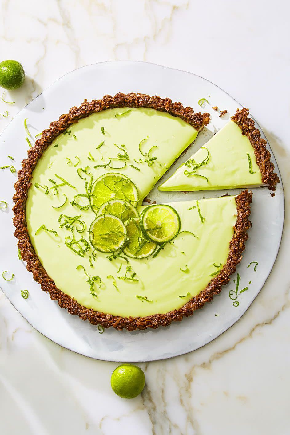 cocoa nutty lime tart with slices of lime on top