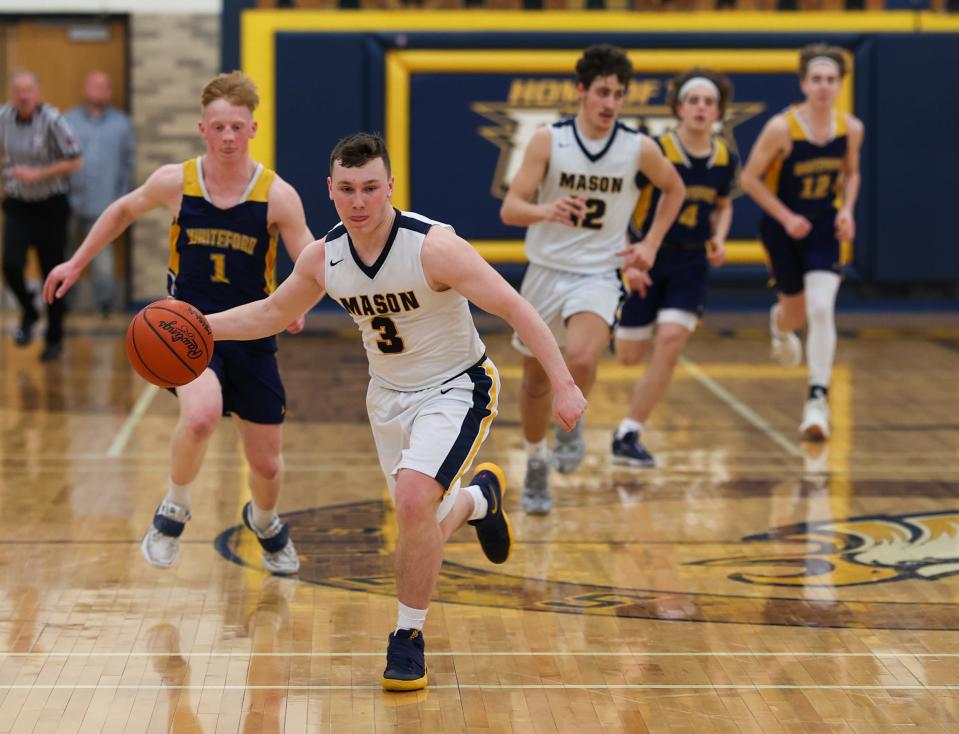 Erie Mason's Casey Brown drives on a fast break during a game against Whiteford on Friday, February 25, 2022.