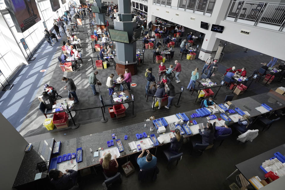 People are given COVID-19 vaccinations on Feb. 11, 2021, at Gillette Stadium in Foxborough, Massachusetts. (Photo: AP Photo/Steven Senne)