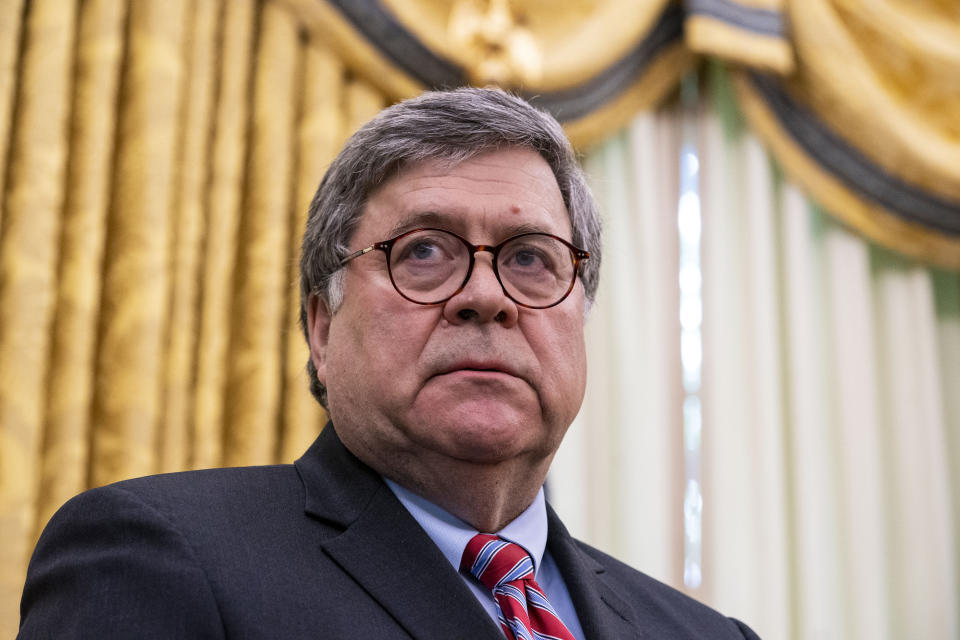 WASHINGTON, DC - MAY 28: Attorney General William Barr listens as U.S. President Donald Trump speaks in the Oval Office before signing an executive order related to regulating social media on May 28, 2020 in Washington, DC. Trump's executive order could lead to attempts to punish companies such as Twitter and Google for attempting to point out factual inconsistencies in social media posts by politicians. (Photo by Doug Mills-Pool/Getty Images)