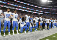 <p>Jalen Reeves-Maybin #44 of the Detroit Lions and teammate Steve Longa #54 take a knee during the national anthem before the game against the Minnesota Vikings on October 1, 2017 at U.S. Bank Stadium in Minneapolis, Minnesota. (Photo by Hannah Foslien/Getty Images) </p>
