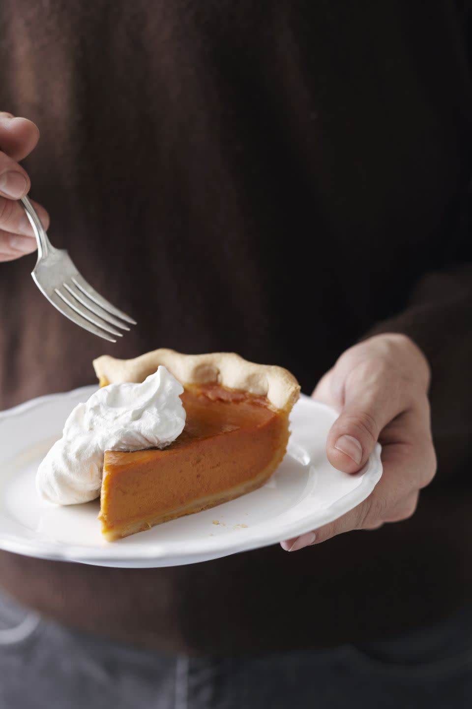 <p>If you think <a href="https://www.countryliving.com/food-drinks/g974/pumpkin-pie-recipes/" rel="nofollow noopener" target="_blank" data-ylk="slk:pumpkin pie;elm:context_link;itc:0;sec:content-canvas" class="link ">pumpkin pie</a> is important to your Thanksgiving feast nowadays, it was just as beloved back in the day. According to local lore, in 1705 Colchester, Connecticut, actually delayed their Thanksgiving celebration for a full week when a molasses shortage curtailed the baking of pumpkin pies. But the truth is we might not even recognize the dessert served centuries ago: Some recipes called for spiced, sweet milk to be cooked directly in the squash over an open flame, while others directed bakers to layer pumpkin and apple.</p> 