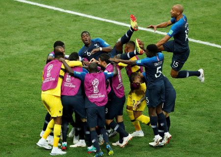 Soccer Football - World Cup - Final - France v Croatia - Luzhniki Stadium, Moscow, Russia - July 15, 2018 France's Kylian Mbappe celebrates with team mates after scoring their fourth goal REUTERS/Maxim Shemetov