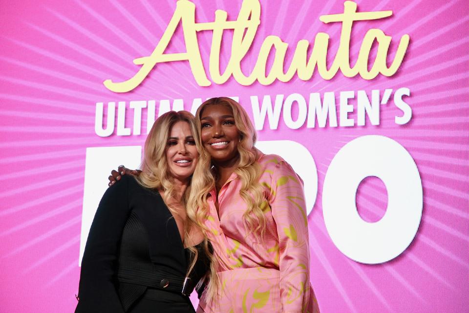 Kim Zolciak-Biermann and Nene Leakes attend the Ultimate Women’s Expo at Cobb Galleria on Nov. 14, 2021 in Atlanta. - Credit: Robin L Marshall/Getty Images
