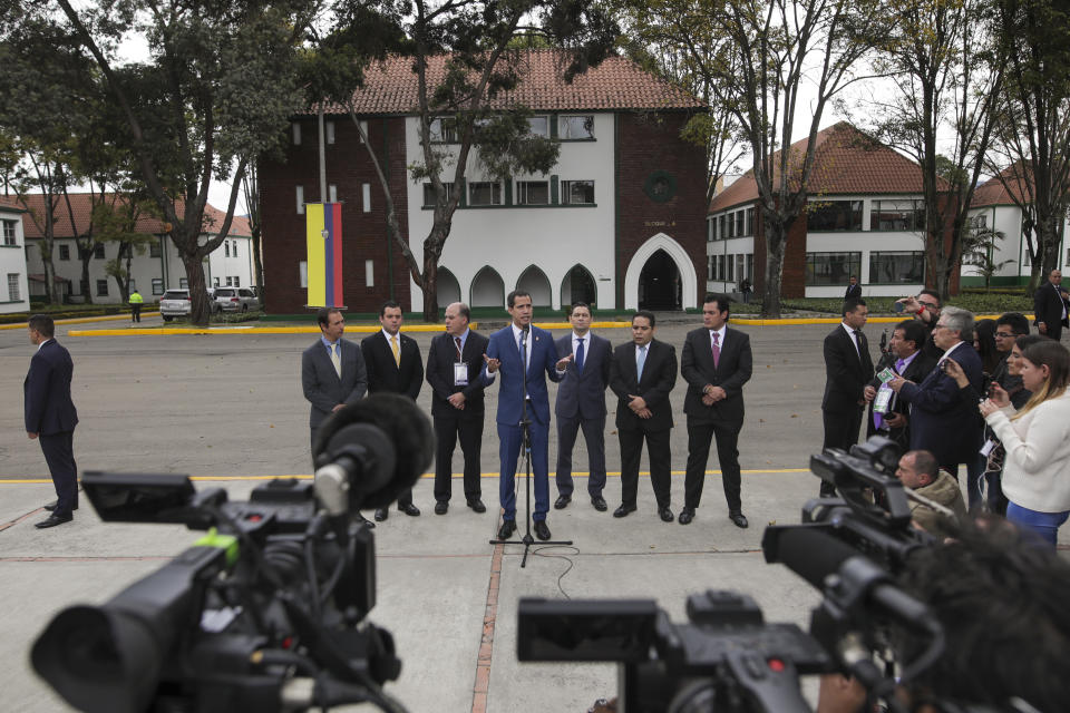 Venezuela's opposition leader Juan Guaido holds a press conference after attending a regional counter-terrorism meeting at the police academy in Bogota, Colombia, Monday, Jan. 20, 2020. Colombian President Ivan Duque and U.S. Secretary of State Mike Pompeo also attended. (AP Photo/Ivan Valencia)