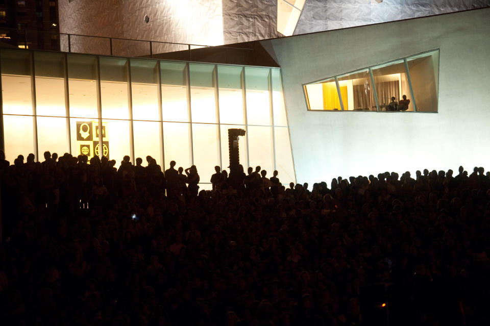 An estimated crowd of 6000 gathers outside the Walker Art Center for the first "Internet Cat Video Film Festival," showcasing the best of cat films on the Internet in Minneapolis Thursday Aug. 30, 2012. The Walker Art Center in Minneapolis held its first-ever online cat video festival, a compilation of silly cat clips that have become an Internet phenomenon, attracting millions of viewers for some of the videos. (AP Photo/Craig Lassig)