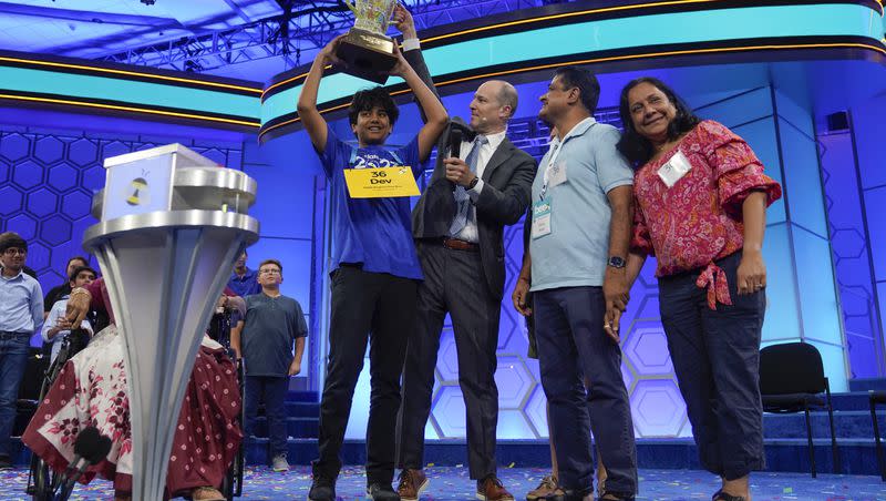 Dev Shah, 14, from Largo, Fla., celebrates winning the Scripps National Spelling Bee alongside his family, Thursday, June 1, 2023, in Oxon Hill, Md.