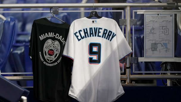 PHOTO: The Miami Marlins honor Miami-Dade police detective Cesar Echaverry with a jersey in the team's dugout during a baseball game against the San Diego Padres, Aug. 17, 2022, in Miami. (Marta Lavandier/AP)