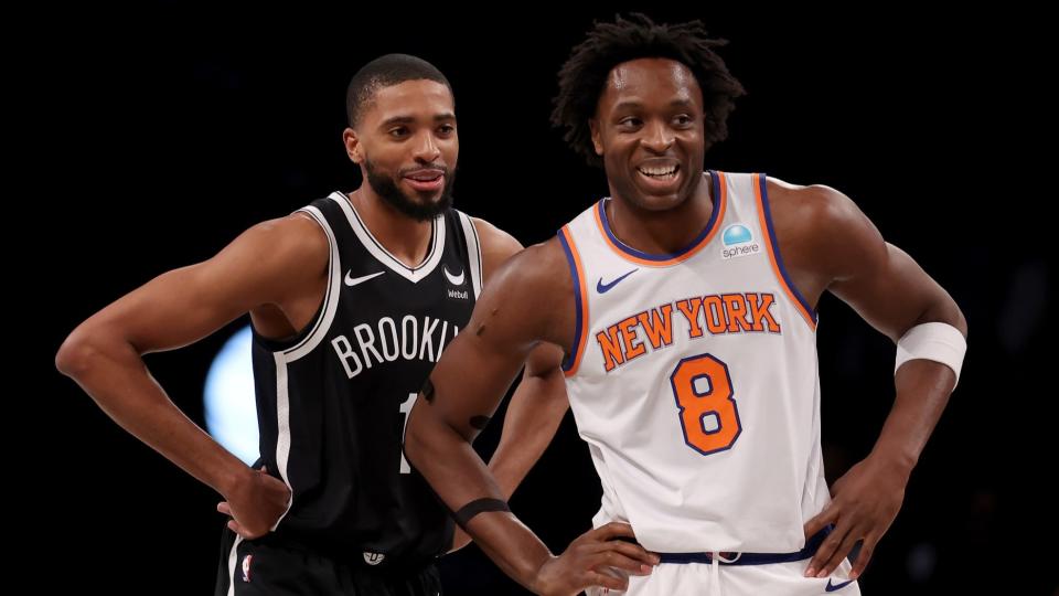 January 23, 2024;  Brooklyn, New York, USA;  Brooklyn Nets forward Mikal Bridges (1) and New York Knicks forward OG Anunoby (8) talk during the first quarter at Barclays Center. 