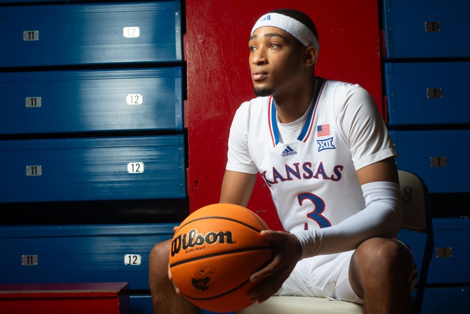 Kansas redshirt senior guard Dajuan Harris Jr. (3) poses during media day Wednesday inside Allen Fieldhouse.