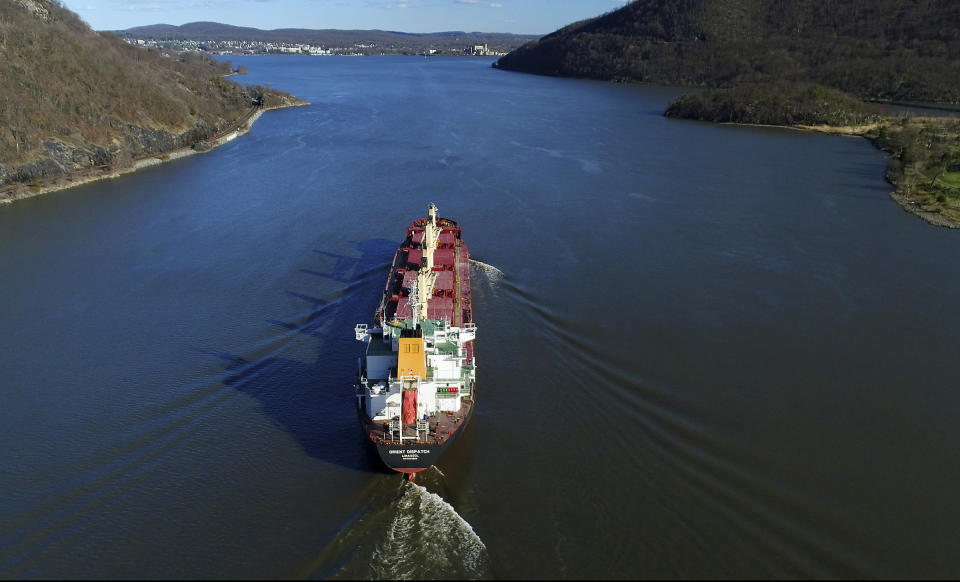 FILE- In this April 26, 2018, file photo, the Orient Dispatch, a bulk carrier ship, makes its way south on the Hudson River near Peekskill, N.Y. The Environmental Protection Agency is poised to make an announcement, Thursday, April 11, 2019, on General Electric's $1.7 billion Hudson River cleanup of PCBs. (AP Photo/Julie Jacobson, File)