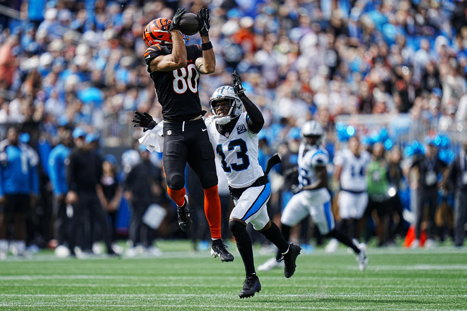 Cincinnati Bengals wide receiver Andrei Iosivas catches a pass in front of Carolina Panthers cornerback Troy Hill during the first half of an NFL football game, Sunday, Sept. 29, 2024, in Charlotte, N.C. (AP Photo/Rusty Jones)