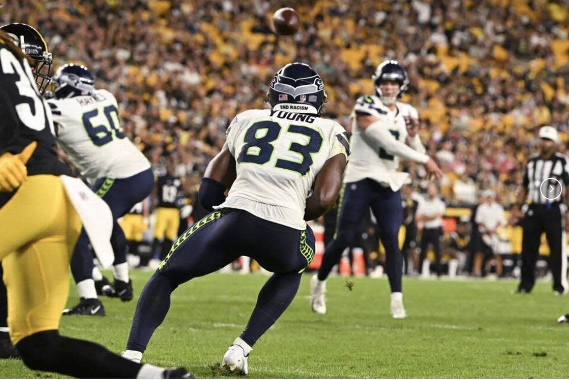 Drew Lock (2) throws a touchdown pass to rookie wide receiver Dareke Young during the second half of the Seahawks’ preseason opener at the Pittsburgh Steelers Aug. 13, 2022.