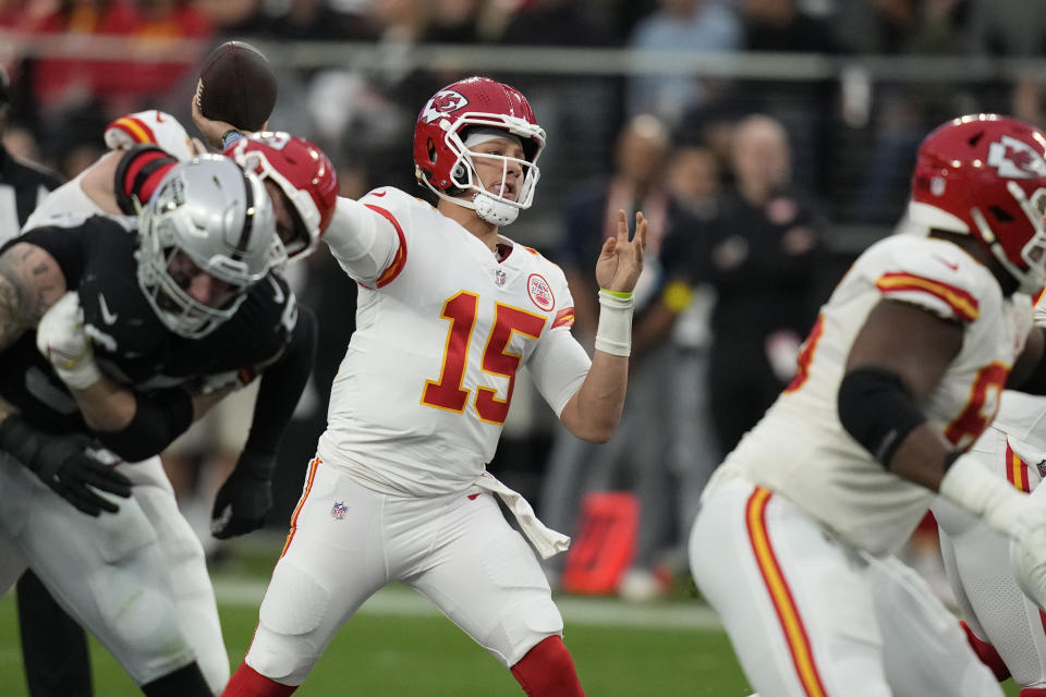 Kansas City Chiefs quarterback Patrick Mahomes throws during the first half of an NFL football game against the Las Vegas Raiders Saturday, Jan. 7, 2023, in Las Vegas. (AP Photo/John Locher)