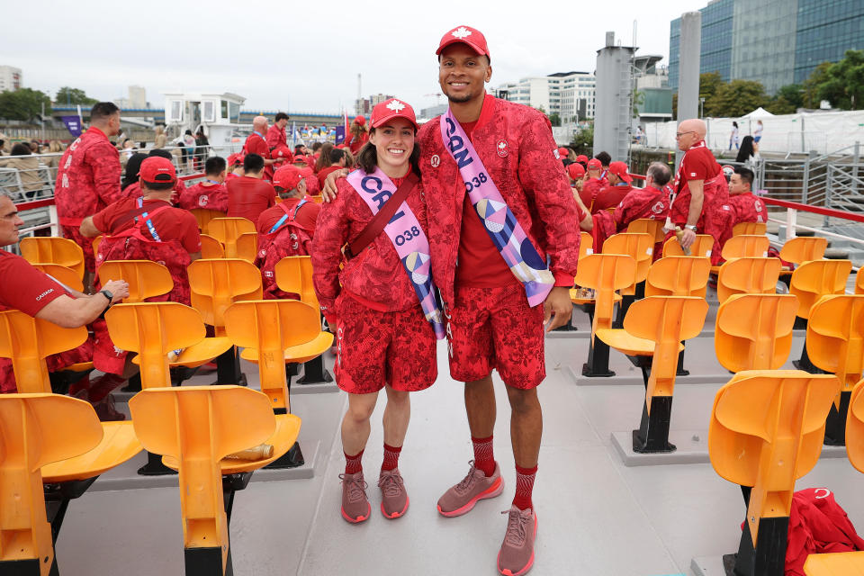 Canadian flag bearers Maude Charron (L) and Andre de Grasse are seen before the opening ceremony of the Paris 2024 Olympic Games in Paris, France, on July 26, 2024. / Credit: CAO CAN/POOL/AFP via Getty Images