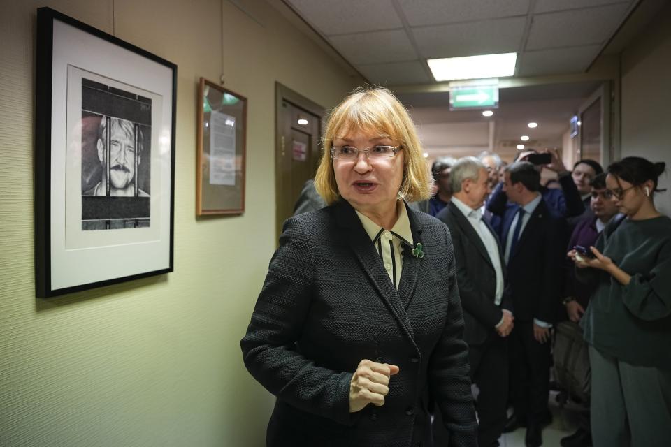 Viktor Bout's wife, Alla, speaks to journalists during an opening of exhibition of artworks by her husband, Russian businessman Viktor Bout, who was sentenced to 25 years in the United States, at the Federation Council of the Federal Assembly of the Russian Federation in Moscow, Russia, Tuesday, Nov. 15, 2022. Russia has sought Bout's release for years and he is believed to be key to a possible prisoner exchange that could free US women's basketball star Brittney Griner. (AP Photo/Alexander Zemlianichenko)