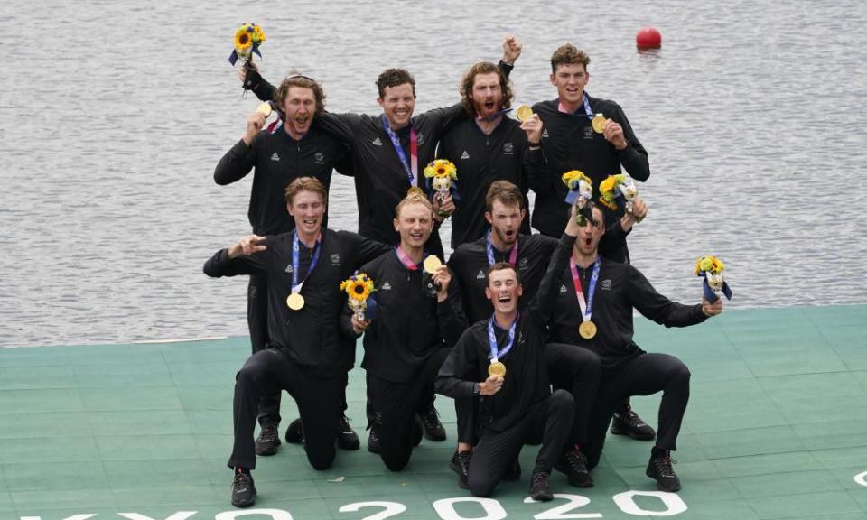 New Zealand celebrate winning the gold medal in the men’s rowing eight final.