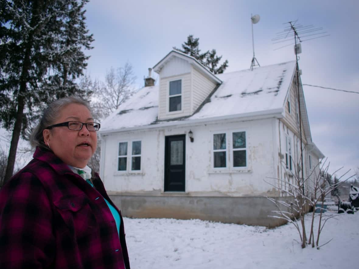 Carla Smith, a 53-year-old who is Cayuga, Wolf Clan, thought celebrity contractor Mike Holmes was going to renovate her century-old farm home on Six Nations of the Grand River — then she learned she wasn't actually speaking to The Holmes Group. (Bobby Hristova/CBC - image credit)