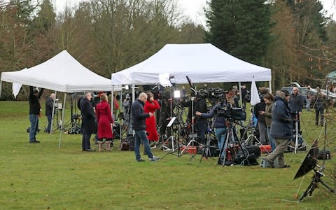 Members of the media gather outside the visitors' centre at the Sandringham Estate, Norfolk, where Queen Elizabeth II and senior royals held crisis talks over Duke and Duchess of Sussex future roles - Credit: PA