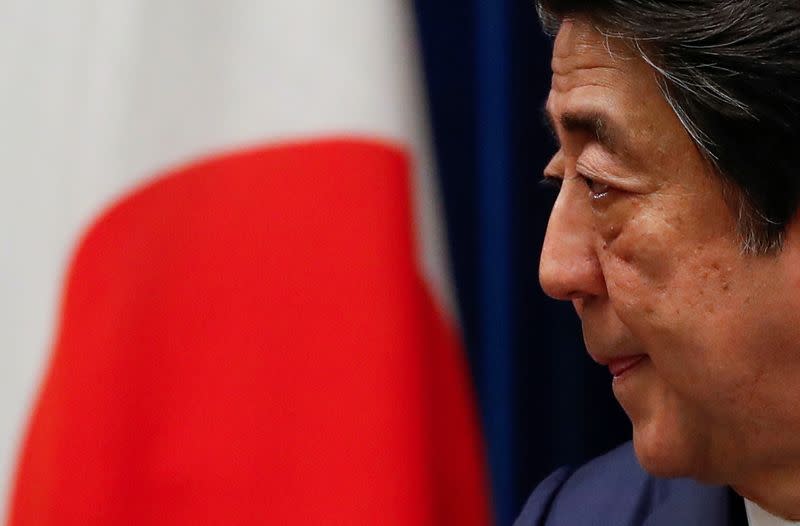 Japan's Prime Minister Shinzo Abe attends a news conference on Japan's response to the coronavirus outbreak at his official residence in Tokyo