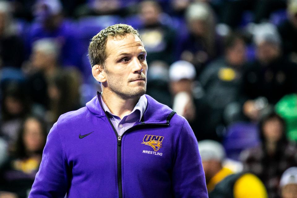 Northern Iowa head coach Doug Schwab watches during a NCAA Big 12 Conference men's wrestling dual against Oklahoma State, Saturday, Jan. 28, 2023, at the McLeod Center in Cedar Falls, Iowa.