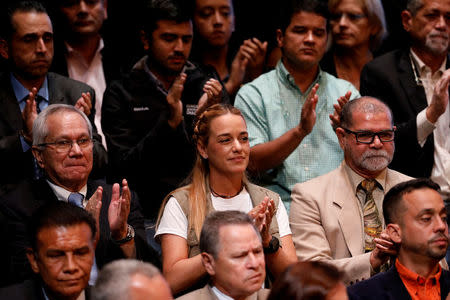 Lilian Tintori, wife of jailed opposition leader Leopoldo Lopez, attends a meeting of the Venezuelan coalition of opposition parties (MUD) in Caracas, Venezuela July 3, 2017. REUTERS/Carlos Garcia Rawlins