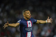 PSG's Kylian Mbappe celebrates after scoring his second goal during the Champions League soccer match Group H against Juventus at the Parc des Princes stadium, in Paris, Tuesday, Sept. 6, 2022. (AP Photo/Thibault Camus)