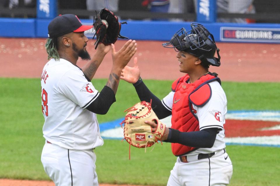 Guardians closer Emmanuel Clase and catcher Bo Naylor celebrate after the Guardians defeated the Toronto Blue Jays on June 22 in Cleveland.