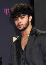 File - This Feb. 18, 2021, file photo shows Joel Pimentel, of CNCO, arriving at Premio Lo Nuestro in Miami. The Latin American boy band CNCO is downsizing. The group announced on its official Instagram page Sunday, May 9, 2021, that 22-year-old Pimentel is leaving the band, making the successful quintet a quartet. (AP Photo/Lynne Sladky, File)